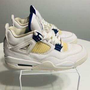 Retro AirJordan Sneakers with Purple Chrome and Yellow Accents